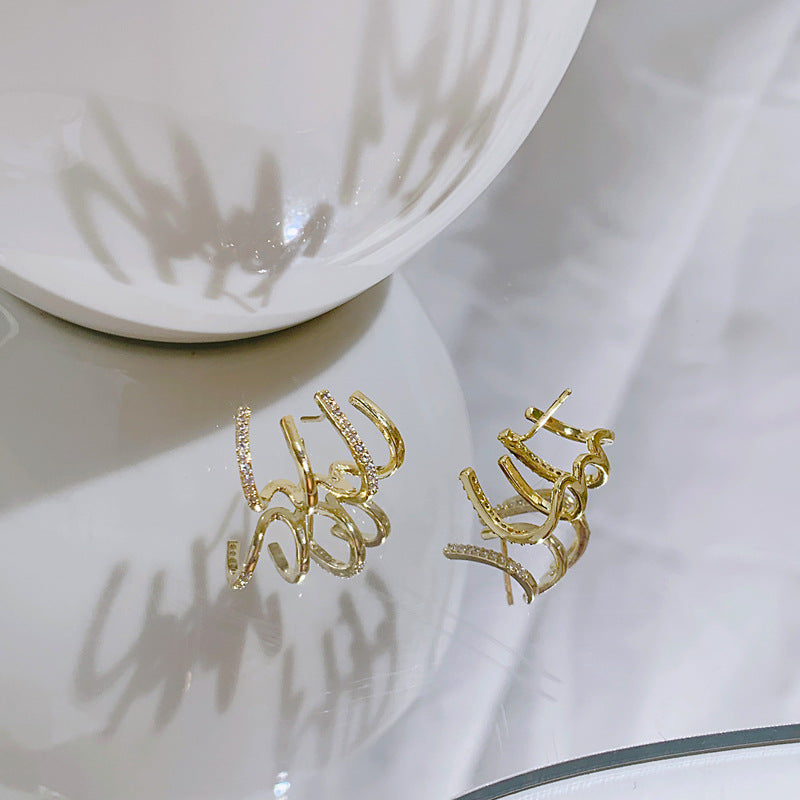 ✨【Kupite 1, dobite 1 gratis】💎2025 Krempljev dizajn s svetlečimi cirkonskimi uhani, eleganten minimalističen slog