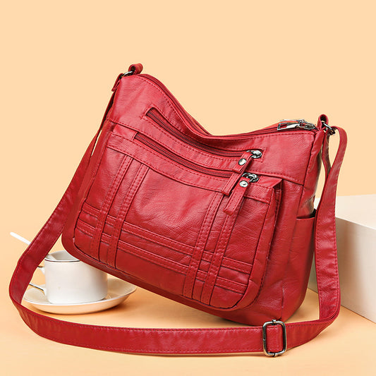 👜【50% kedvezmény】Modern, egyszerű válltáska puha bőrből, tágas válltáska utazótáskához