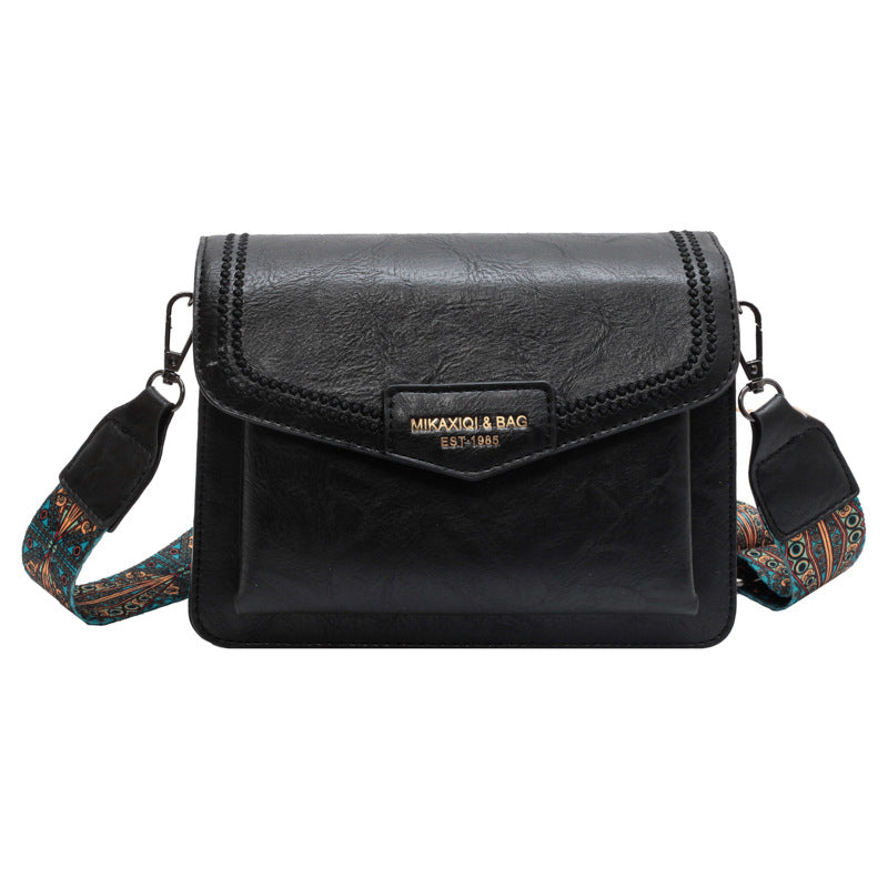 👜👜Nový štýl 2026, široký ramenný popruh, malá kožená taška s veľkou kapacitou. Retro crossbody malá štvorcová kabelka