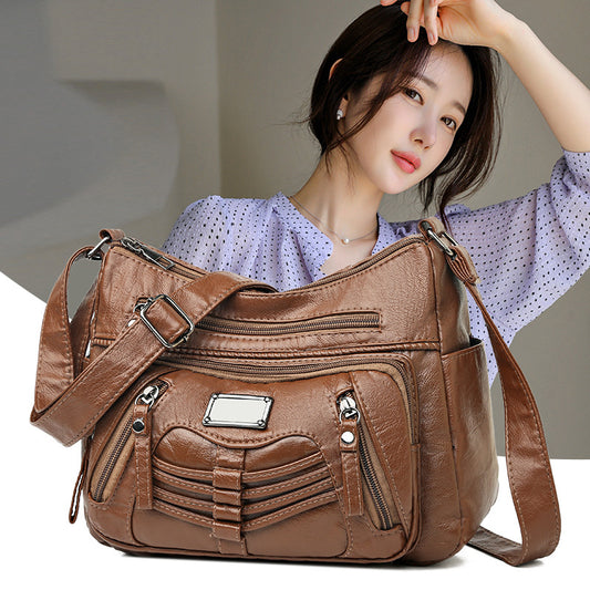 【3 farby】Nová štýlová a všestranná dvojvrstvová crossbody kabelka z mäkkej kože s veľkou kapacitou, ležérna a moderná.