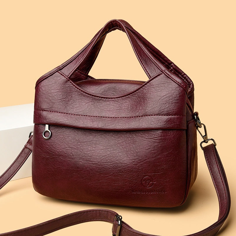 👜Retro dámská kabelka přes rameno, velká kapacita, jednoduchá a všestranná, jednobarevná, volná cestovní taška, vyrobená z vysoce kvalitní měkké kůže.