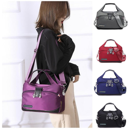 👜【50 % popust】Modna ženska lahka torbica iz oxfordskega blaga z veliko prostornino, 💧Vodoodporna, ✅Popolna za potovanja in nakupovanje, ✅Več možnosti nošenja: torbica, torba čez ramo, torba za čez ramo