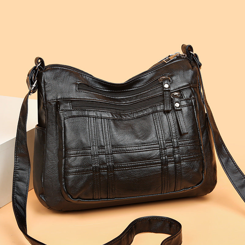 👜【50% kedvezmény】Modern, egyszerű válltáska puha bőrből, tágas válltáska utazótáskához