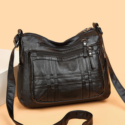 👜【50% kedvezmény】Modern, egyszerű válltáska puha bőrből, tágas válltáska utazótáskához