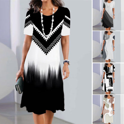👗【50% отстъпка】【XS-5XL】👗Модна рокля с щампа и обло деколте за големи размери 2026