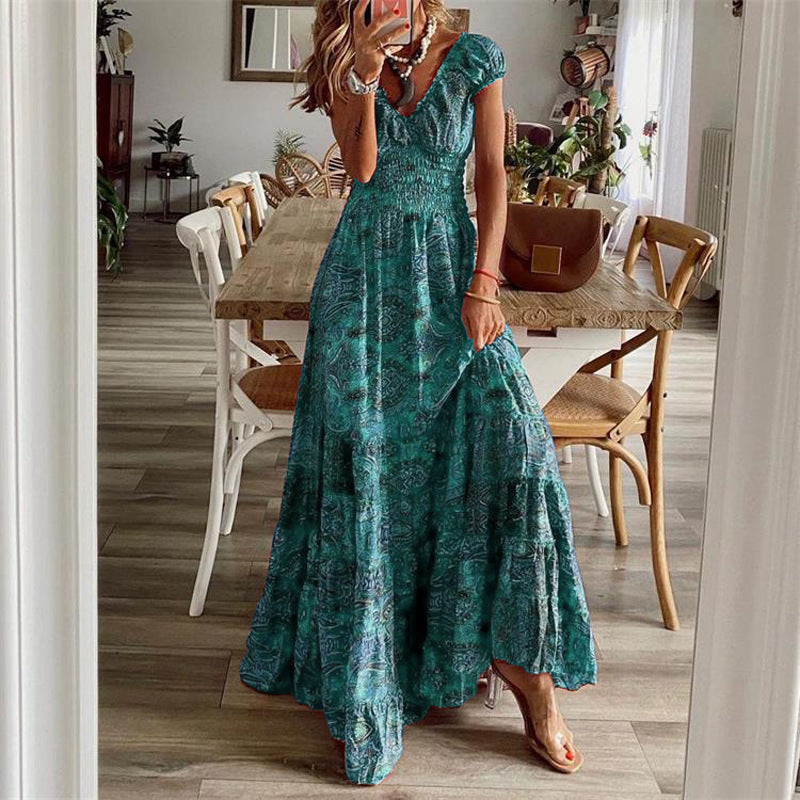 👗✨【50% popust 🔥】【S–2XL】Nova dolga boemska obleka s poudarjenim pasom, ležernega kroja s cvetličnim vzorcem
