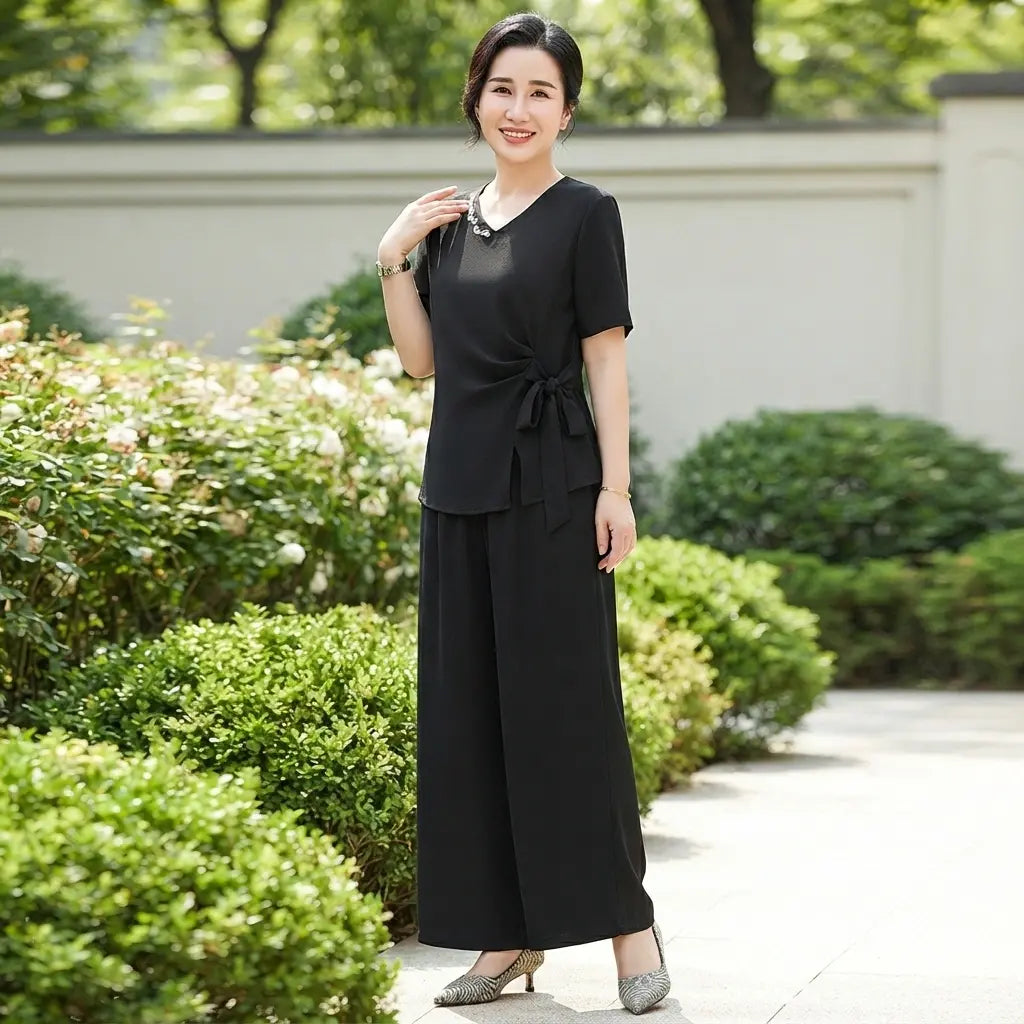 👚【43-105kg】Nowy, dopasowany garnitur z dekoltem w serek, stylowy perłowy design, falbany w kształcie muszki wyszczuplające i ukrywające brzuszek, wygodny i przewiewny.