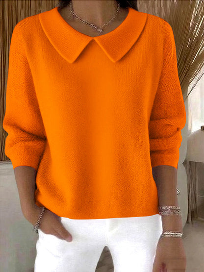 Cómoda camiseta de manga larga con cuello en V para otoño e invierno.