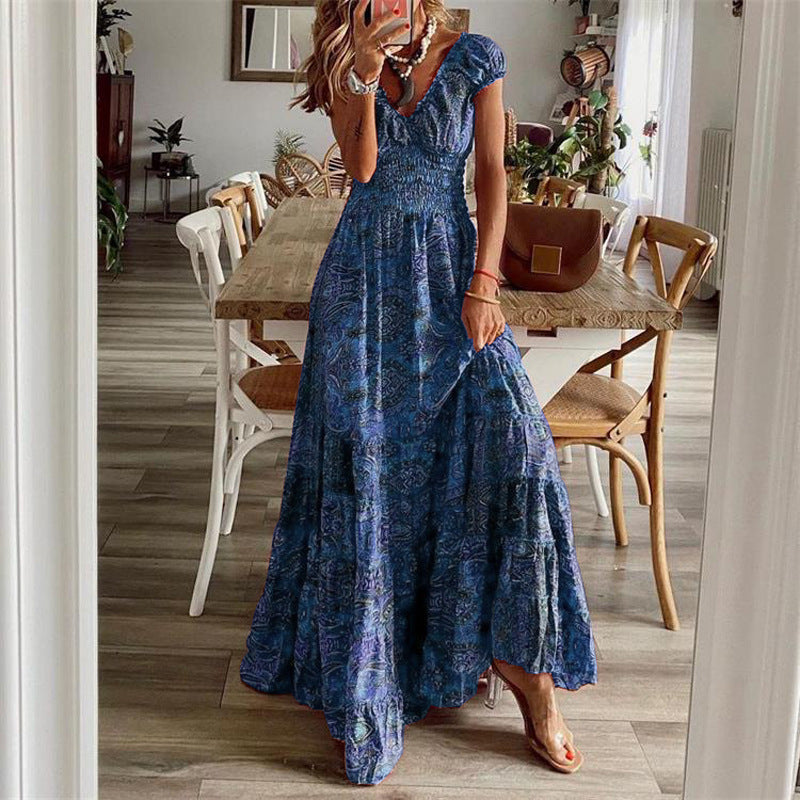 👗✨【50% popust 🔥】【S–2XL】Nova dolga boemska obleka s poudarjenim pasom, ležernega kroja s cvetličnim vzorcem