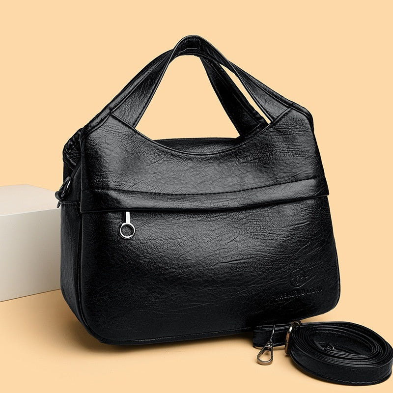 👜Retro dámská kabelka přes rameno, velká kapacita, jednoduchá a všestranná, jednobarevná, volná cestovní taška, vyrobená z vysoce kvalitní měkké kůže.