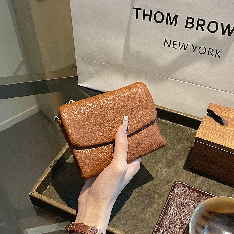 🔥✨【50% kedvezmény】⏰Pebble uniszex valódi bőr pénztárca RFID védelemmel🔥