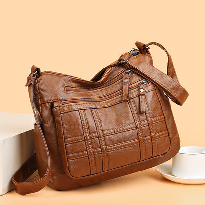 👜【50% kedvezmény】Modern, egyszerű válltáska puha bőrből, tágas válltáska utazótáskához
