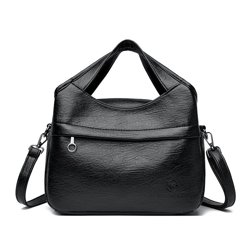 👜Retro dámská kabelka přes rameno, velká kapacita, jednoduchá a všestranná, jednobarevná, volná cestovní taška, vyrobená z vysoce kvalitní měkké kůže.